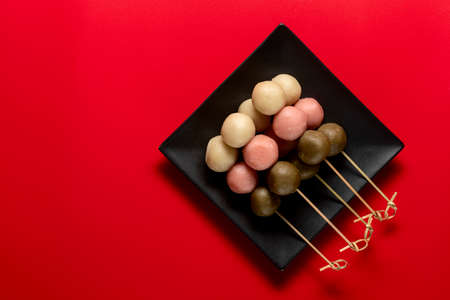 Japanese Dango multicolor dessert wirh sweet soy sauce.の写真素材