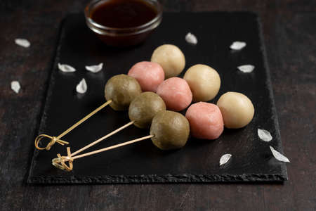 Japanese Dango multicolor dessert wirh sweet soy sauce.の写真素材