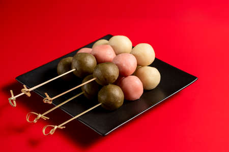 Japanese Dango multicolor dessert wirh sweet soy sauce.の写真素材
