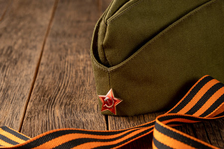 Cap with a star and George ribbon. The concept of the Great Victory Day.の写真素材