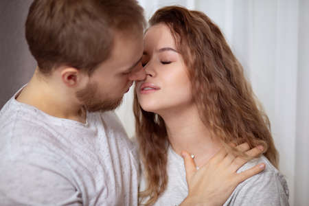 young beautiful loving couple before kiss