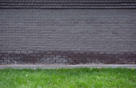 grey brick wall t green lawn, horizontal endless seamless patternの写真素材
