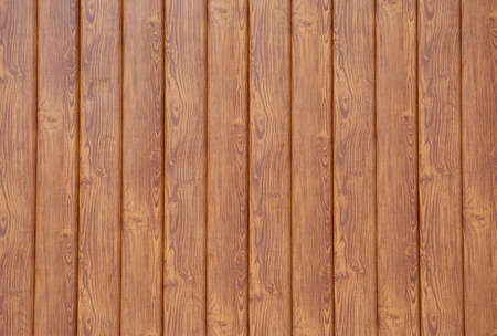 brown wooden background or color texture of boards, horizontal photo