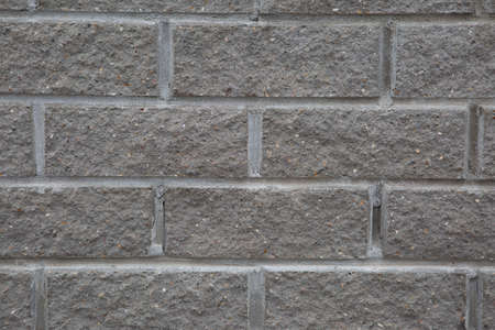 grey brick wall texture. background material for industrial construction