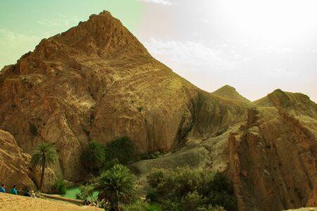 An oasis among the mountains of lifelessの写真素材