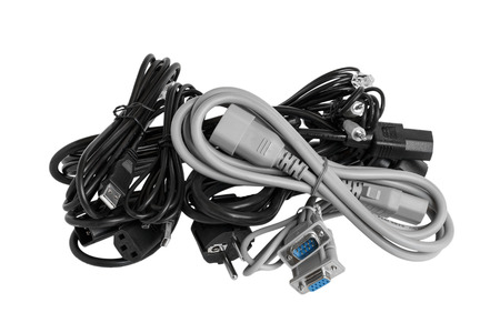 Electric cable with plugs for the computer on a white background