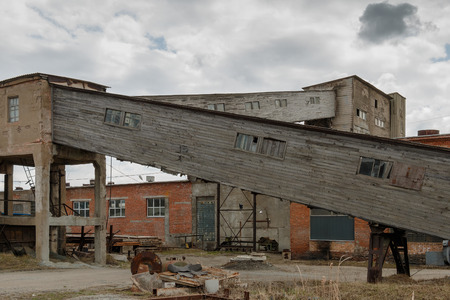 Wooden gallery at plant for transportation of sand and a stoneの写真素材