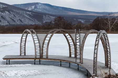 Wooden pier on the lake in the park of a family in the neighborhood of Vladivostokの写真素材