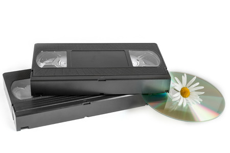 Old videotapes and laser disk on a white backgroundの写真素材