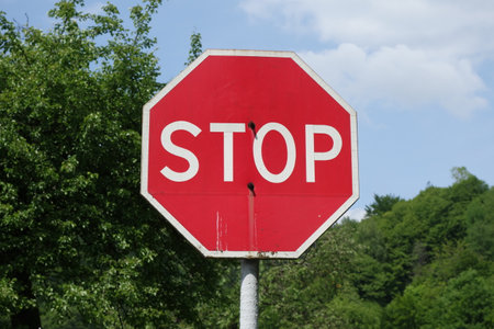 Stop sign on the roadの写真素材