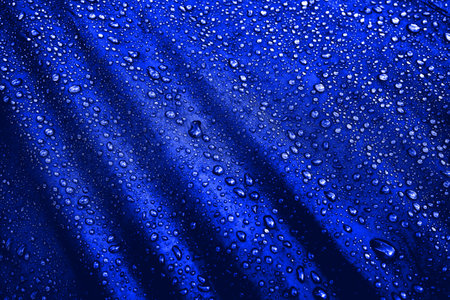 Water drops on the fabricの写真素材