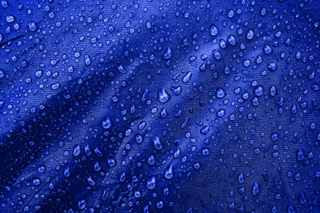Water drops on the fabricの写真素材