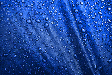 Water drops on the fabricの写真素材