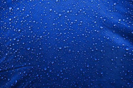 Water drops on the fabricの写真素材