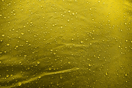 Water drops on the fabricの写真素材