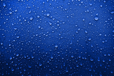 Water drops on the fabricの写真素材
