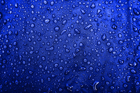 Water drops on the fabricの写真素材