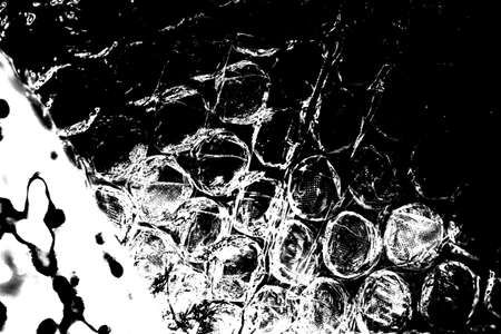 Abstract background. Monochrome texture. Image includes a effect the black and white tones.