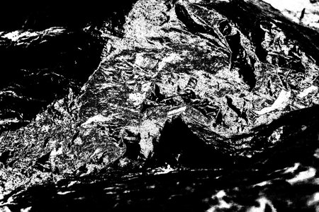 Abstract background. Monochrome texture. Image includes a effect the black and white tones.