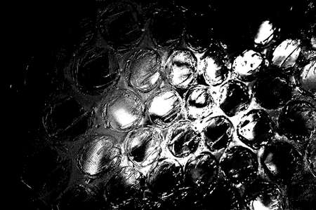 Abstract background. Monochrome texture. Image includes a effect the black and white tones.