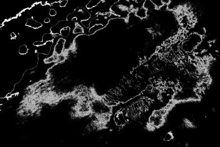 Abstract background. Monochrome texture. Image includes a effect the black and white tones.
