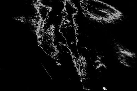 Abstract background. Monochrome texture. Image includes a effect the black and white tones.