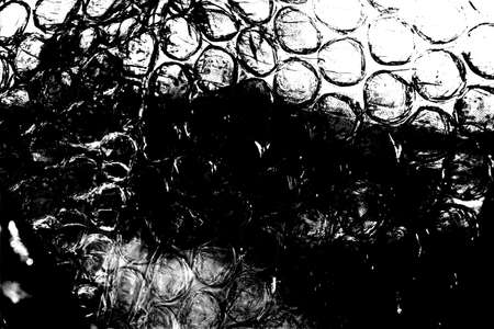 Abstract background. Monochrome texture. Image includes a effect the black and white tones.