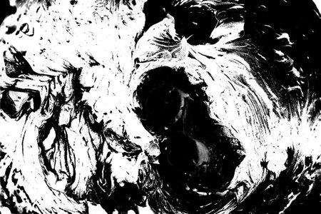 Abstract background. Monochrome texture. Image includes a effect the black and white tones.