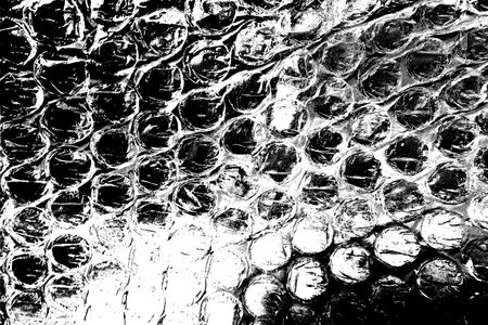 Abstract background. Monochrome texture. Image includes a effect the black and white tones.