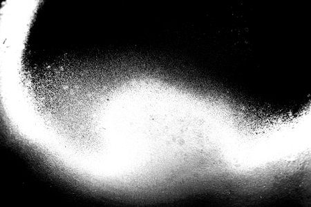 Abstract background. Monochrome texture. Image includes a effect the black and white tones.
