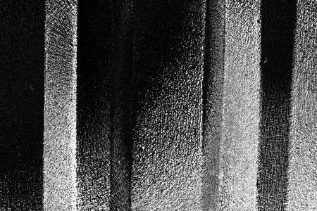 Abstract background. Monochrome texture. Image includes a effect the black and white tones.