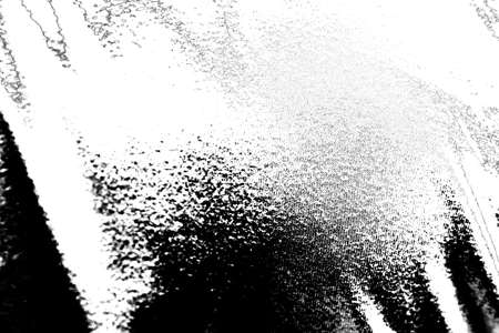 Abstract background. Monochrome texture. Image includes a effect the black and white tones.