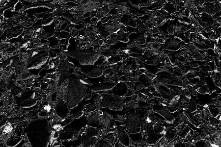 Abstract background. Monochrome texture. Image includes a effect the black and white tones.