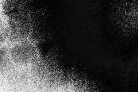 Abstract background. Monochrome texture. Image includes a effect the black and white tones.
