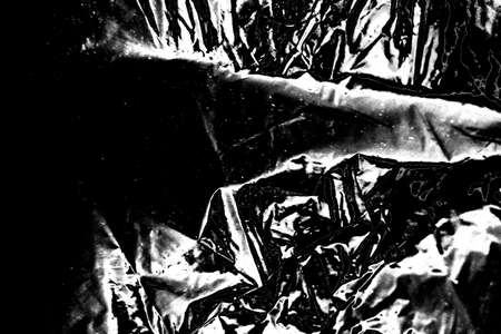 Abstract background. Monochrome texture. Image includes a effect the black and white tones.