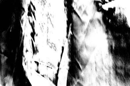 Abstract background. Monochrome texture. Image includes a effect the black and white tones.