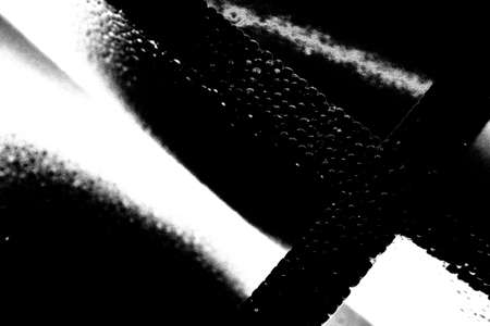 Abstract background. Monochrome texture. Image includes a effect the black and white tones.