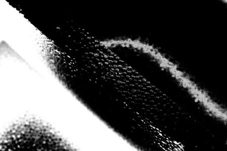 Abstract background. Monochrome texture. Image includes a effect the black and white tones.