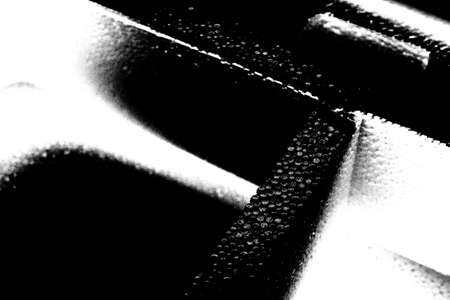 Abstract background. Monochrome texture. Image includes a effect the black and white tones.