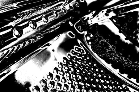 Abstract background. Monochrome texture. Image includes a effect the black and white tones.