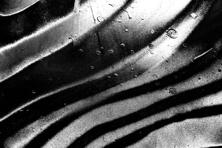 Abstract background. Monochrome texture. Image includes a effect the black and white tones.の写真素材