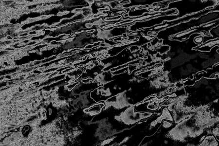 Abstract background. Monochrome texture. Image includes a effect the black and white tones.