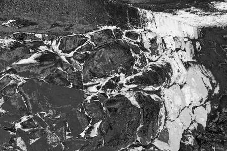 Abstract background. Monochrome texture. Image includes a effect the black and white tones.