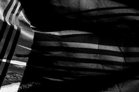 Abstract background. Monochrome texture. Image includes a effect the black and white tones.