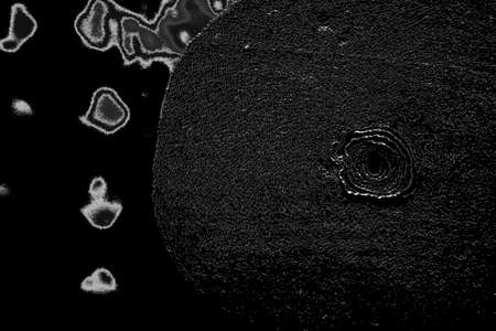 Abstract background. Monochrome texture. Image includes a effect the black and white tones.