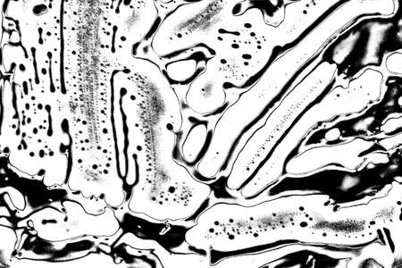 Abstract background. Monochrome texture. Image includes a effect the black and white tones.