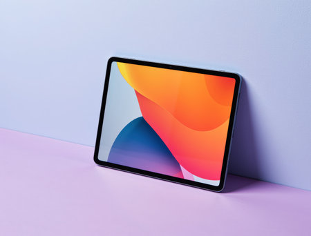 Tablet computer with colorful abstract background. 3d render illustration.の素材