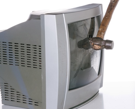 old TV screen smashed with a hammer