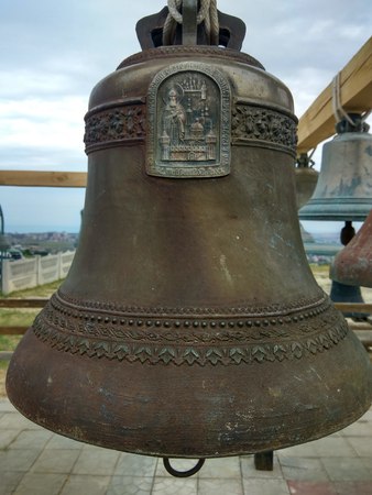 The antique bell of an old Russian templeの写真素材