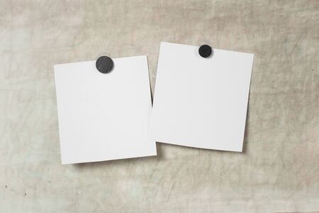 Blank Photo photo frame with soft shadows and  magnet tape isolated on grey paper background as...